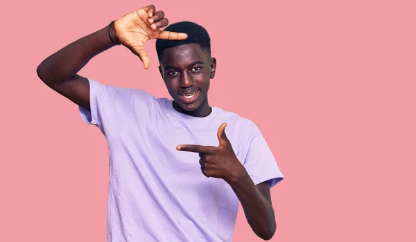 Young African American Man Wearing Casual Clothes Smiling Making Frame — Stock Photo, Image