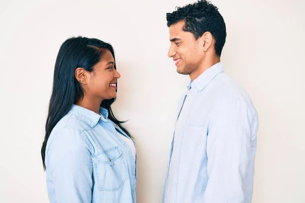 Beautiful Latin Young Couple Wearing Casual Clothes Looking Side Relax — Stock Photo, Image