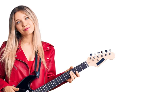 Young Beautiful Blonde Woman Playing Electric Guitar Thinking Attitude Sober — Stock Photo, Image