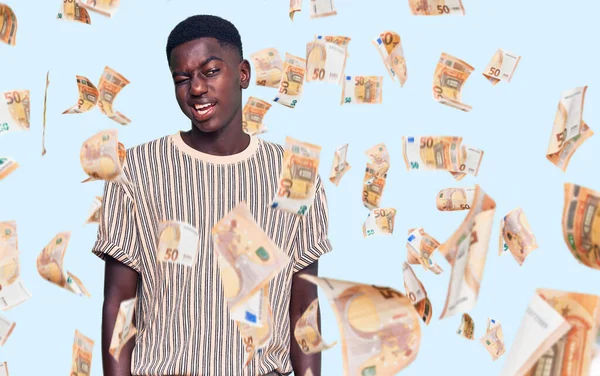 Young African American Man Wearing Casual Clothes Winking Looking Camera — Stock Photo, Image