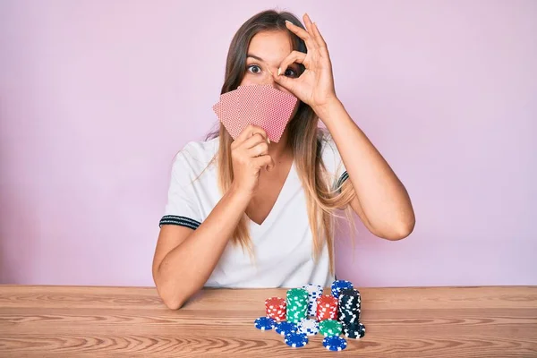 Beautiful Caucasian Woman Playing Gambling Poker Covering Face Cards Smiling — Stock Photo, Image