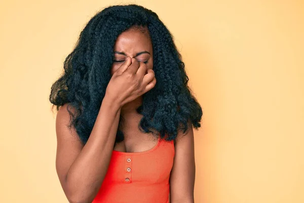 Beautiful African Woman Wearing Casual Clothes Tired Rubbing Nose Eyes — Stock Photo, Image