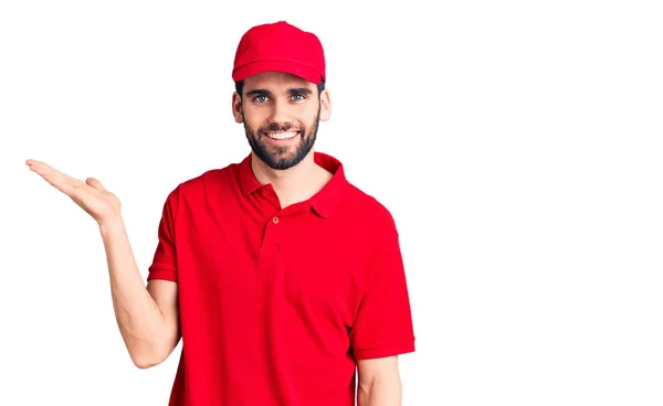 Young Handsome Man Beard Wearing Delivery Uniform Smiling Cheerful Presenting — Stock Photo, Image