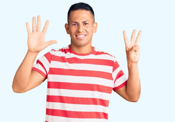 Young Handsome Latin Man Wearing Casual Clothes Showing Pointing Fingers — Stock Photo, Image