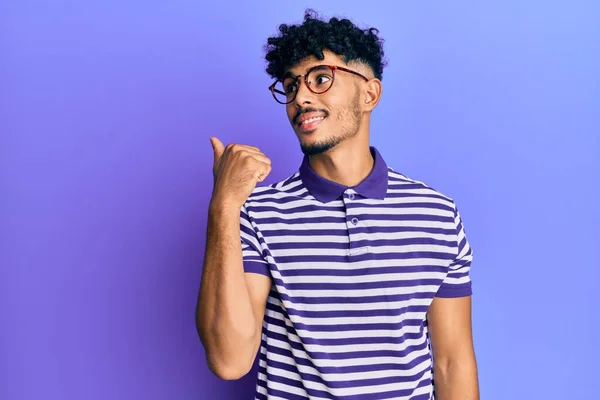 Young Arab Handsome Man Wearing Casual Clothes Glasses Pointing Thumb — Stock Photo, Image