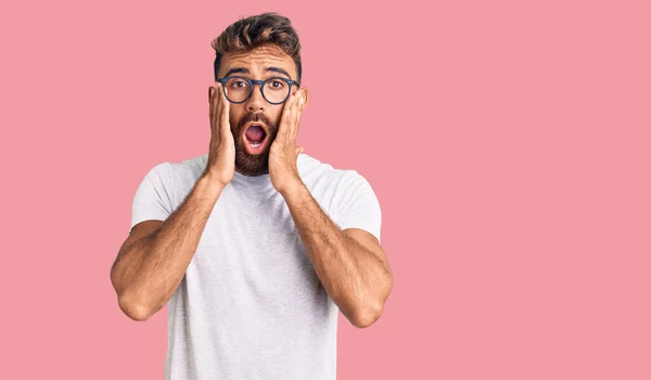 Young Hispanic Man Wearing Casual Clothes Glasses Afraid Shocked Surprise — Stock Photo, Image
