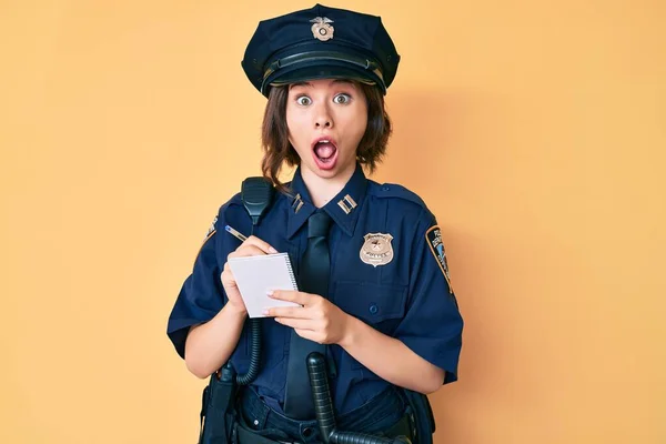 Young Beautiful Girl Wearing Police Uniform Writing Traffic Fine Afraid — Stock Photo, Image