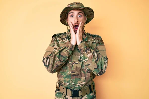 Young Caucasian Man Wearing Camouflage Army Uniform Afraid Shocked Surprise — Stock Photo, Image