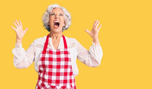 Senior Grey Haired Woman Wearing Apron Crazy Mad Shouting Yelling — Stock Photo, Image