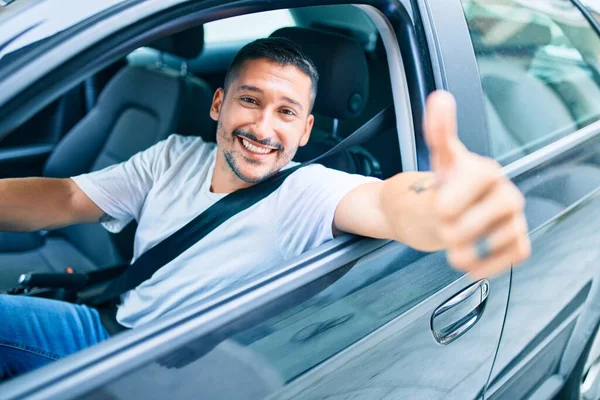Young Hispanic Man Smiling Happy Doing Sign Driving Car — Stock Photo, Image