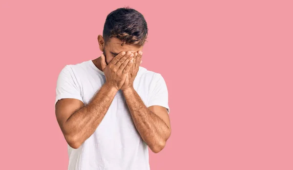 Young Hispanic Man Wearing Casual White Tshirt Sad Expression Covering — Stock Photo, Image