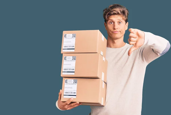 Young Handsome Man Holding Delivery Package Angry Face Negative Sign — Stock Photo, Image