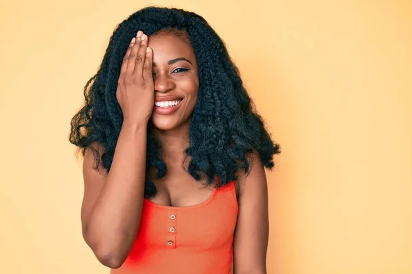 Beautiful African Woman Wearing Casual Clothes Covering One Eye Hand — Stock Photo, Image