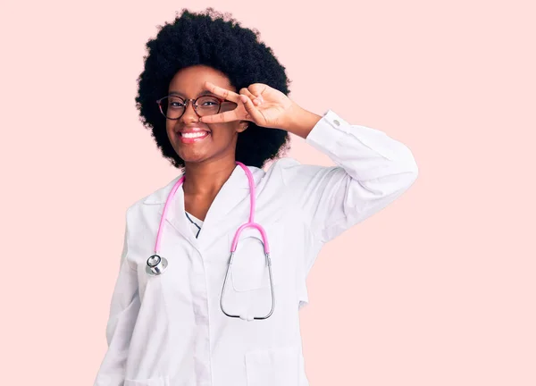 Young African American Woman Wearing Doctor Coat Stethoscope Doing Peace — Stock Photo, Image