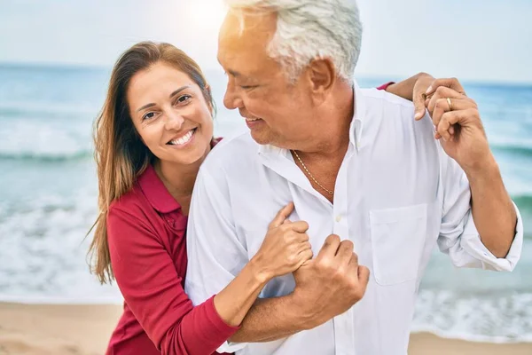 Middle Age Hispanic Couple Smiling Happy Hugging Walking Beach — Stock Photo, Image