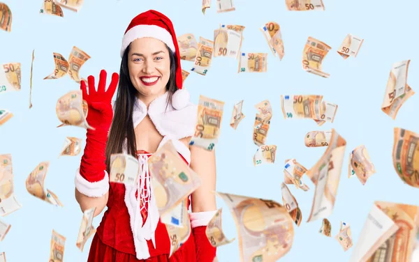 Genç Beyaz Bir Kadın Noel Baba Kostümü Giyip Dört Numarayı — Stok fotoğraf