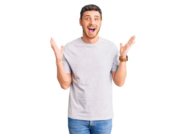 Handsome Young Man Bear Wearing Casual Tshirt Celebrating Crazy Amazed — Stock Photo, Image