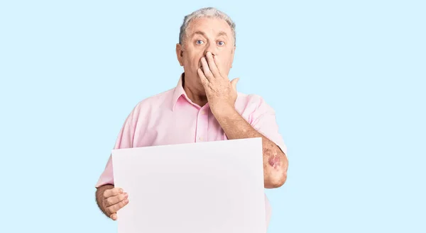Senior Grey Haired Man Holding Blank Empty Banner Covering Mouth — Stock Photo, Image