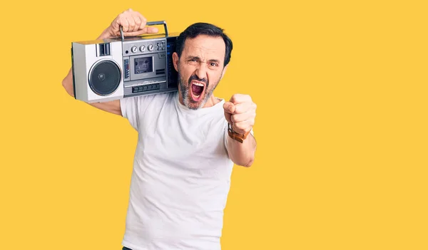 Middle Age Handsome Man Listening Music Using Vintage Boombox Annoyed — Stock Photo, Image