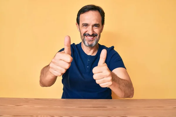 Middle Age Hispanic Man Wearing Casual Clothes Sitting Table Approving — Stock Photo, Image