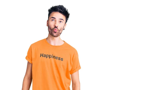 Young Hispanic Man Wearing Shirt Happiness Word Message Making Fish — Stock Photo, Image