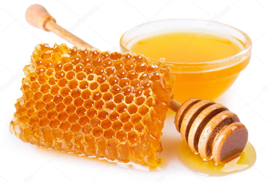 honey with honeycomb isolated on white background