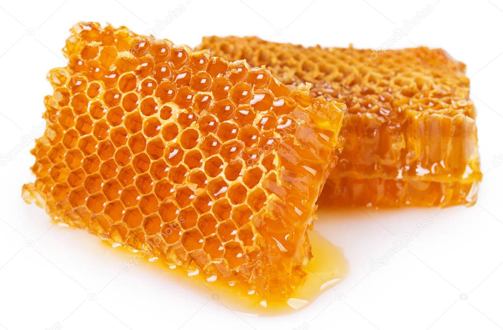 honey with honeycomb isolated on white background