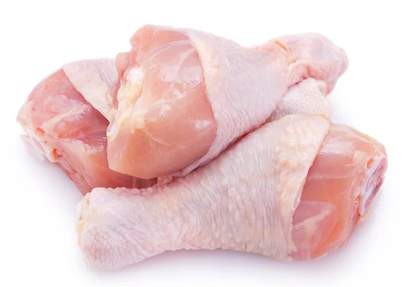 Pernas de frango cru no fundo branco — Fotografia de Stock