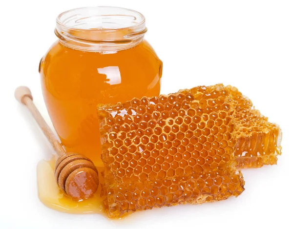 Honeycomb with honey on white background Stock Image