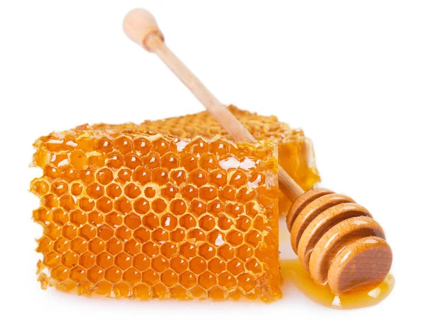 Panal con miel sobre fondo blanco —  Fotos de Stock
