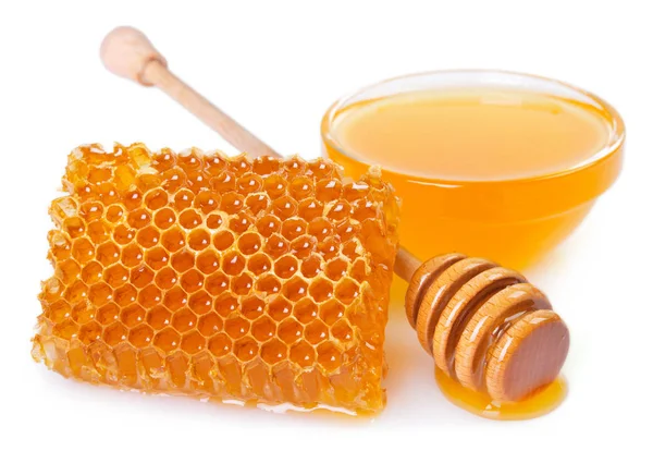 白い背景に蜂蜜とハニカム — ストック写真