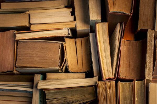 vintage books, view from above, forming a texture