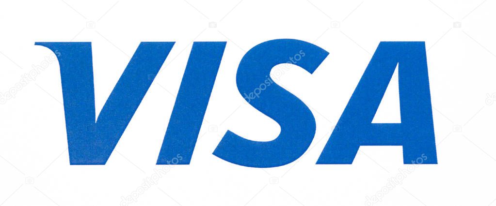 Chisinau, Moldova - September 19, 2018: Visa logo printed on the paper and placed on white background.Visa - American multinational company providing services of payment operations.