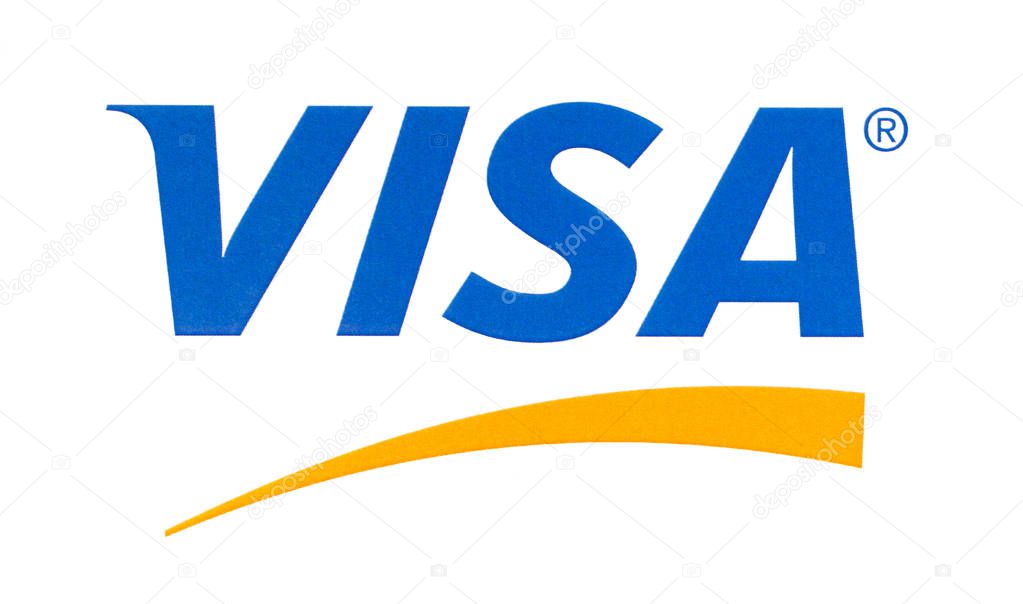 Chisinau, Moldova - September 19, 2018: Visa logo printed on the paper and placed on white background.Visa - American multinational company providing services of payment operations.