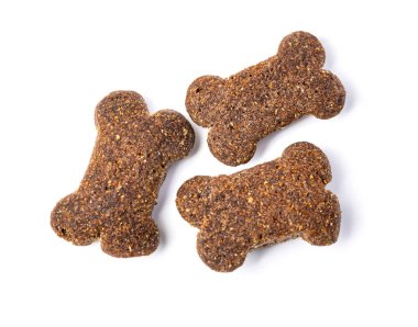 Beyaz bir arka plan üzerinde izole evde beslenen hayvan yiyecek. Yakın çekim.