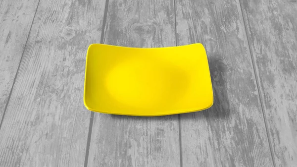 Yellow square empty dish on wooden — Stock Photo, Image