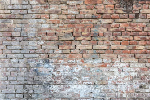Eski, eski, kirli tuğla duvarın arka planı — Stok fotoğraf