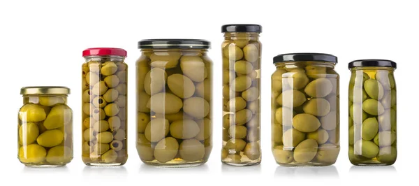 Olives in  bottles on a white Royalty Free Stock Photos