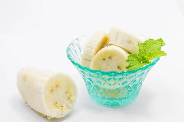 Banán egy csésze borsmenta — Stock Fotó