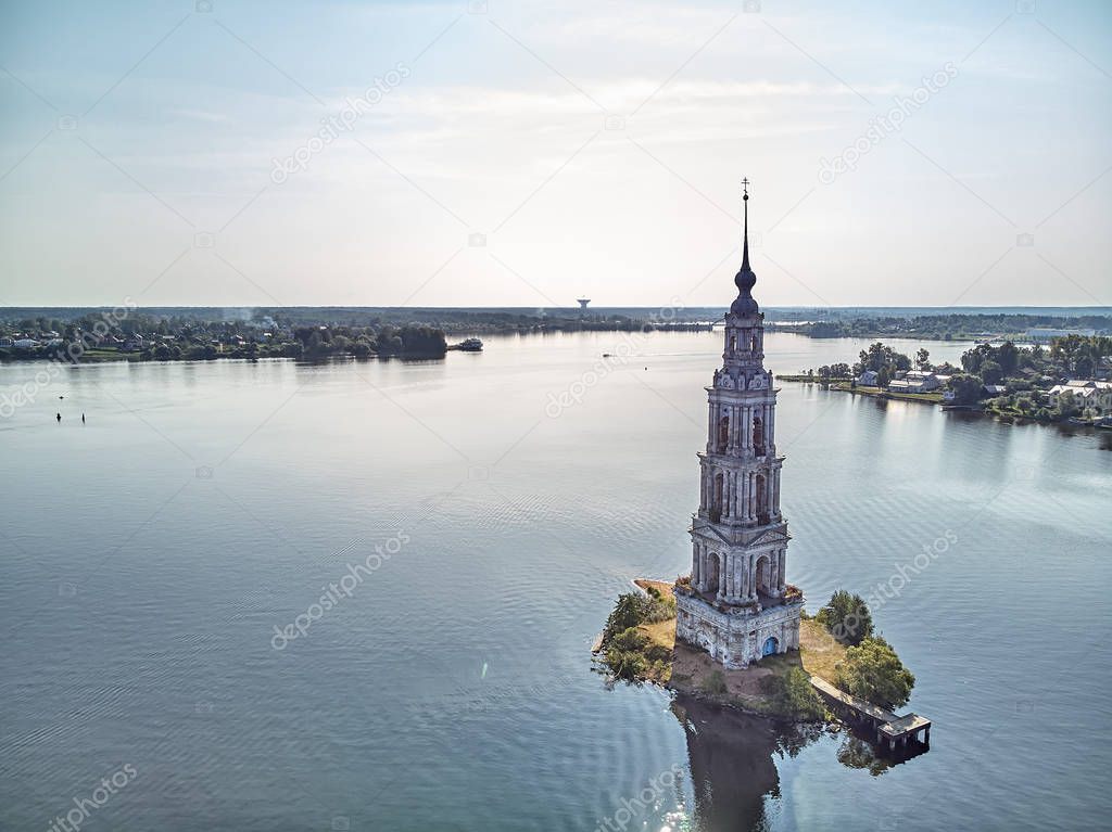 Kalyazinskaya bell tower of St. Nicholas Cathedral in the water (a flooded bell tower). Kalyazin, Tver region, Russia. Drone view