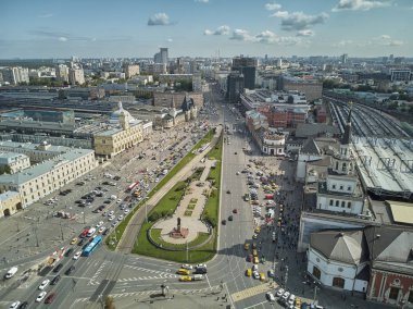 Moscow, Russia - July 21, 2019. Moscow top view at the Komsomolskaya square, also known as the square of three railway stations. Aerial drone view clipart