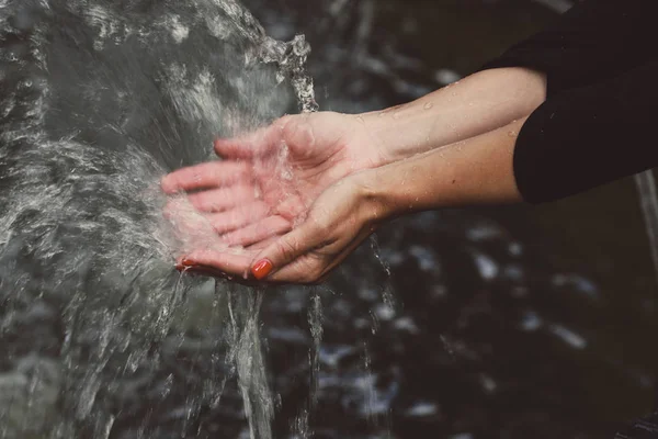 water spray on the hand