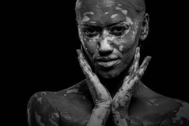 women painted with make-up and paints