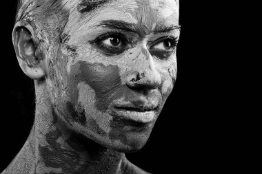 women painted with make-up and paints