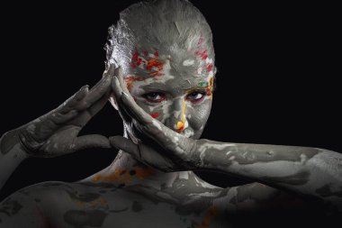 women painted with make-up and paints