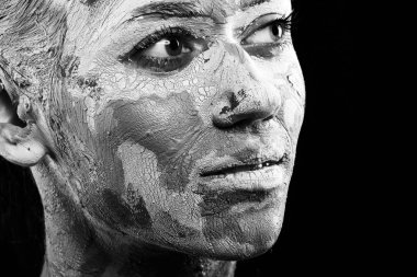 women painted with make-up and paints