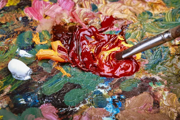 palette with oil paints for painting