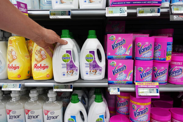 BELGIUM - JULY 2019: Laundry detergents in a Cora Hypermarket. Reckitt Benckiser Group plc (RB) is a British multinational consumer goods company, producer of health, hygiene and home products.