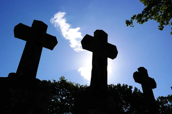 Three crosses, a symbol of  Good Friday, a Christian holiday commemorating the crucifixion of Jesus and his death at Calvary.