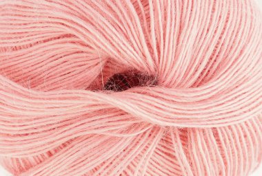 Soluk pembe örgü yün. Yakın çekim
